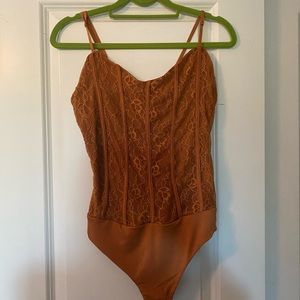 Revolve Lace Bodysuit